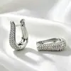 Pendientes de superventas transfronterizos europeos y americanos, cierres de oreja de circonita de cobre, totalmente incrustados de diamantes, adecuados para ir al trabajo, con un toque de lujo ligero y de alta gama, pendientes para mujer