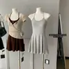 Hermoso y Atractivo Conjunto de Dos Piezas: Camisa Asimétrica de Lana Tencel con Cuello Grande y Vestido de Punto con Escote Halter 'Pure Desire' Vestido de Tirantes Negro
