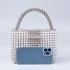 Bolso de mano para mujer con cuentas plateadas explosivas personalizadas y acrílico transparente tejido a mano.