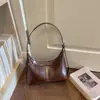 Bolso de Viaje de Alta Gama para Dama 2026 Nuevo Elegante Piel Suave Versátil Forma de Empanada Gran Capacidad Bolso Cruzado