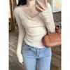 Elegante camiseta plisada de hombros descubiertos para mujer, única y chic, adelgazante, protectora del sol, de manga larga, asimétrica, top de hombro regular para primavera y otoño