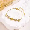 Pulseira Cruzada Série Trevo de Cinco Folhas Que Não Desbota, Feminina de Verão Dourada Retrô de Aço Titânio Colorida com Zircônia