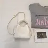 Bolsa balde de cor sólida da moda para mulheres, nova coleção outono 2026, bolsa tote de alta qualidade com um design único, adequada para o dia a dia, pode ser carregada como bolsa de ombro ou bolsa transversal