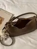 Bolso de Hombro Simple de Color Sólido de Alto Valor, Nicho, Estilo Relajado, Personalidad, para el Trabajo, Moda, Otoño 2026
