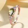 Anel Huajie de Zircônia com Diamante Oval e Quatro Garras Cruzado AliExpress Novo Anel Verde Oliva Ouro Rosa Simples de Temperamento