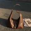 Bolsa de Verão Feminina Versátil de Grande Capacidade 2026 Nova Vintage de Ombro Único Estilo Balde com Design Texturizado para o Dia a Dia Bolsa Tote
