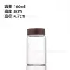 Fabricante Original Tapa de Madera 47 mm Botella de Vidrio de Borosilicato Alto para Exhibición y Empaque de Joyería, Tarro Sellado, Botella de Té