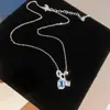 Collar de Zirconia Azul Cielo Transparente Súper Brillante con Forma de Estrella Geométrica para Mujer Cadena para Clavícula de Lujo Ligero con Sentido de Alta Gama Cadena para el Cuello Versátil de Moda