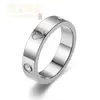 Moda europea y americana 2023 nuevo nicho anillos personalizados en forma de corazón con incrustaciones de diamantes para parejas, anillos para el dedo pequeño y anillos a juego, directamente del fabricante