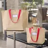 Bolsas de tote de papel kraft compuesto, bolsas de tote de tienda de ropa de alta gama, logo personalizado, empaque de regalo de uso general para centros comerciales, venta al por mayor