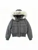 Chaqueta de algodón versátil estilo coreano 2026 nueva para mujer, con capucha ribeteada de pelo, en color gris gaviota, corte holgado y diseñada para abrigar en invierno.