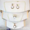 Nuevo Conjunto de Joyería de Perlas Barrocas Naturales Cerámica Incrustada Hecho a Mano Moda Francesa Accesorios de Joyería de Tres Piezas