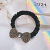 Versión coreana de anillo de salchicha gorda que combina con todo, anillo de cuerda para el cabello de alta elasticidad con lazo de diamantes de imitación, cabeza de bola vintage, cabeza femenina, cuerda con punto