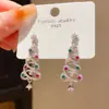 Pendientes de Árbol de Navidad Hueco de Zirconia de Lujo Ligero Aguja Plateada Copo de Nieve Envuelto Pendientes Personalizados Exquisitos de Nicho Retro Europeos y Americanos para Mujeres