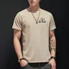 Camiseta de Manga Corta Estampada para Hombre con Cuello Redondo 2026 Verano Nuevo Estilo Top de Media Manga Marca de Moda Camisa para Vestir por Capas
