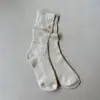 Calcetines nuevos para mujer de otoño e invierno, calcetines retro de color liso de doble aguja, calcetines de moda de seda dorada y plateada, hilo grueso, calcetines cómodos de rizo, calcetines de longitud media