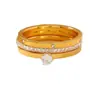 Anel de Aço Inoxidável com Diamante Venda Quente Transfronteiriça Anel para Mulheres Design de Nicho Anel de Aço Titânio Dourado Diamante Grande Conjunto de Três Peças