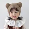 Bonito gorro de punto estilo coreano para bebés y niños pequeños, gorro pullover de lana con cordones para otoño e invierno, gorro protector para las orejas para niños y niñas