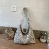 Bolsa de Mujer de Diseño de Nicho Nuevo para Verano 2026 Gran Capacidad de Moda Bolso de Hombro Cruzado Bolso Tote Casual Elegante para el Trabajo