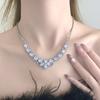 Collar de diamantes flash pendientes pulsera para mujer 2024 Nuevo lujo ligero nicho alta calidad cadena de clavícula accesorios de vestido de venta caliente