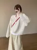 Cárdigan de punto blanco versátil retro europeo y americano, nuevo suéter casual holgado de punto trenzado otoño/invierno, prenda exterior para mujer, moderno