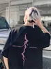 Camiseta de Manga Corta con Estampado de Rayos Rosas para Niños Verano 2026 Nueva Marca Trendy Americana High Street para Parejas Top de Media Manga