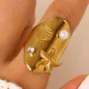 Anel de Aço Inoxidável com Pérola de Zircônia Estilo Oceano Cruzado Europeu e Americano Anel de Estrela do Mar Concha Búzio Joia de Mão Elegante para Mulheres