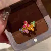 Novo Anel de Flor de Três Pétalas Arco-Íris Personalidade Feminina Leve Luxo Pequeno Muitas Cores Versátil Moda Aberto Ajustável Anel Feminino