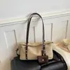 Bolso Transfronterizo de Nicho con Sensación de Alta Gama para Mujer 2026 Nuevo de Moda Primavera Retro para el Trabajo y el Viaje Bolso de Hombro Único Bolso de Axila