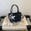 Cesta de Compras Versátil Estilo Coreano para Senhoras Bolsa de Mão com Temperamento Nicho 2026 Nova Bolsa Pequena para Mulheres Bolsa Saco Tendência para Mulheres