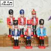La Serie del Cascanueces que Nunca Mueve la Boca Colgante de Navidad 12cm Hombre de Nogal Pintado Marioneta Soldado Colgante para Árbol de Navidad