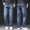 Jeans de alta gama para hombre en Hong Kong, color gris azulado con forro de felpa, nuevos pantalones casuales cálidos de pierna recta holgada, talla grande, para hombres de mediana edad