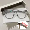 Nuevo modelo 2026 de gafas para miopía, armazón café, efecto adelgazante para fotos, bloqueo de luz azul, micas transparentes, unisex, armazón ultraligero, venta al por mayor