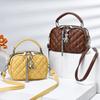 Bolsa pequena Lingge feminina 2024 nova moda borla pequena bolsa redonda textura ombro portátil bolsa mensageiro uma geração de cabelo