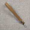 En stock Hombres y Mujeres Cinturón Exquisito Piel Sintética Impermeable Rayado Billetera para Monedas Bolso de Cintura de Mano Accesorios Colgante Decorativo Cinturón de Mano