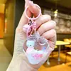 Recién llegado: Llavero de Caricatura de Conejo Flotante Relleno de Aceite para Dulces, Adorno de Arena Líquida de Manzana, Lindo Colgante para Bolsa y Coche