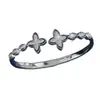 Nuevo brazalete abierto floral elegante y exquisito europeo y americano, moda de lujo ligero popular con un toque de alta gama, pulsera de nicho y versátil