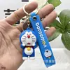 Llavero colgante de dibujos animados de Doraemon, Adorno para llavero de coche de Doraemon, Peluche de mercancía de anime del hombre gordo azul