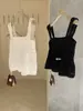 Wgwe8499 Ropa de Mujer Guangzhou Shisanxing Otoño e Invierno Nuevo Encaje Ganchillo Sin Tirantes Sin Mangas Chaleco Top Corto