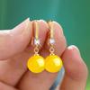 Pendientes de novia con perla ovalada y colgante de gota de agua de Amazon AliExpress.