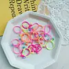Diadema para el cabello de niños accesorios para el cabello color caramelo diadema anudada constantemente cuerda para el cabello niñas alta elasticidad banda de goma pequeña de frijol rojo para niños venta al por mayor