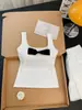 Em Estoque Verão 2025 Novo Estilo Menina Borboleta Doce Elástico Slim Fit Regata Decorada com Laço com Lindo Design nas Costas, Sem Mangas