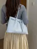 Bolso de mano tejido de patrón de nicho estilo coreano para mujer, nuevo modelo de verano 2026, bolso tote de gran capacidad, bolso de hombro para el trabajo