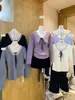 Otoño e Invierno Nuevo Dulce Elegante Cuello en V Lazo de Encaje Reductor de Edad Cubre Carne Jersey de Punto de Manga Larga Ropa de Punto para Mujer