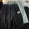 2024 Nuevos pantalones cortos casuales de seda de hielo de secado rápido para hombre, verano, delgados, holgados, con caída, modernos, bordados, rectos