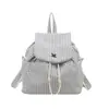 Mochila de moda con cordón de gran capacidad, nueva bolsa versátil de estilo casual Ins para el verano de 2025, mochila escolar popular este año