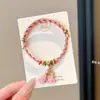 Pulsera de Hilo Rojo de Bebé de Dibujos Animados 2026 Nuevo Estilo Bendición Pequeño Zongzi Pulsera Estilo Chino Festival del Bote del Dragón Hilo de Cinco Colores Ajustable Venta al por Mayor