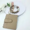 Pulsera con Llavero de Abalorios de Silicona de Margarita Pulsera de Cuero con Borla Colgante para Bolso Venta al por Mayor Regalo de Año Nuevo