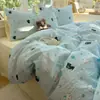 Juego de ropa de cama de cuatro piezas de algodón 100% clase A para dormir sin ropa, funda de edredón de algodón puro con estampado de dibujos animados fresco y lindo estilo ins, juego de tres piezas para dormitorios de estudiantes