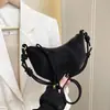 Bolso pequeño retro Shuai Mi para mujer, nuevo bolso de moda tipo 'dumpling' otoño 2026, bolso de hombro texturizado, bolso cruzado para el día a día